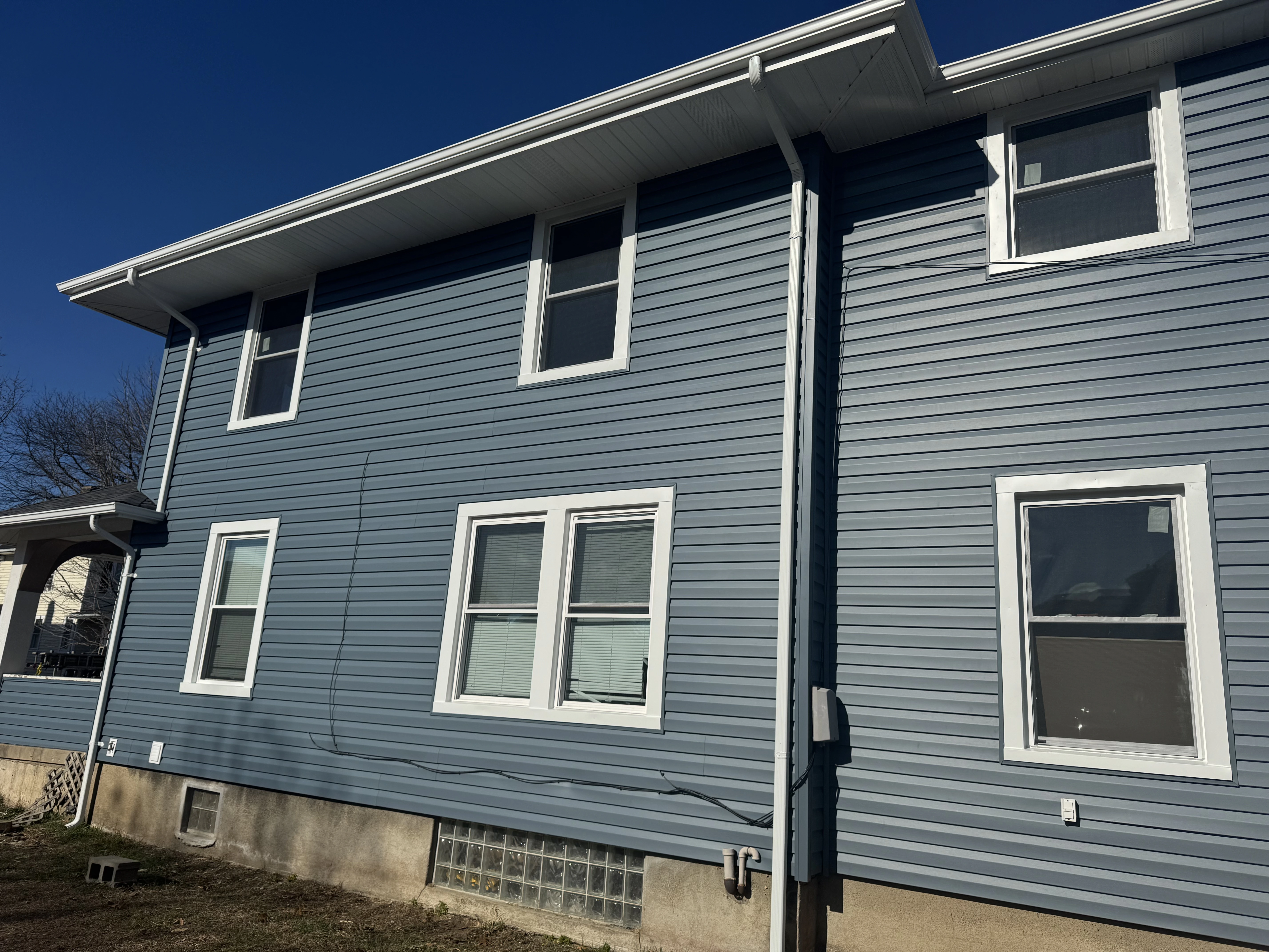 Blue siding installed on a residential home