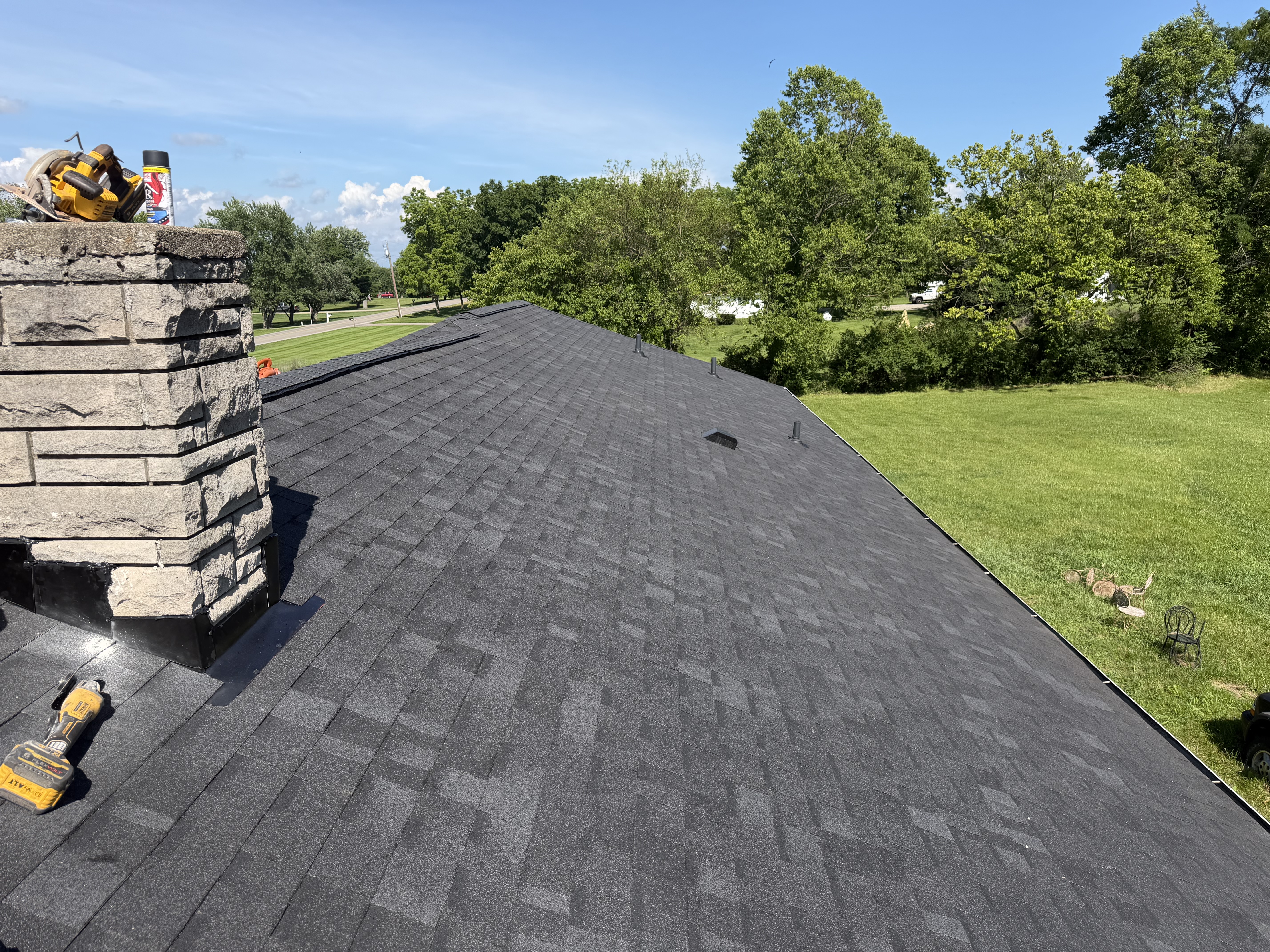 Finished asphalt shingle roof with clean ridge lines