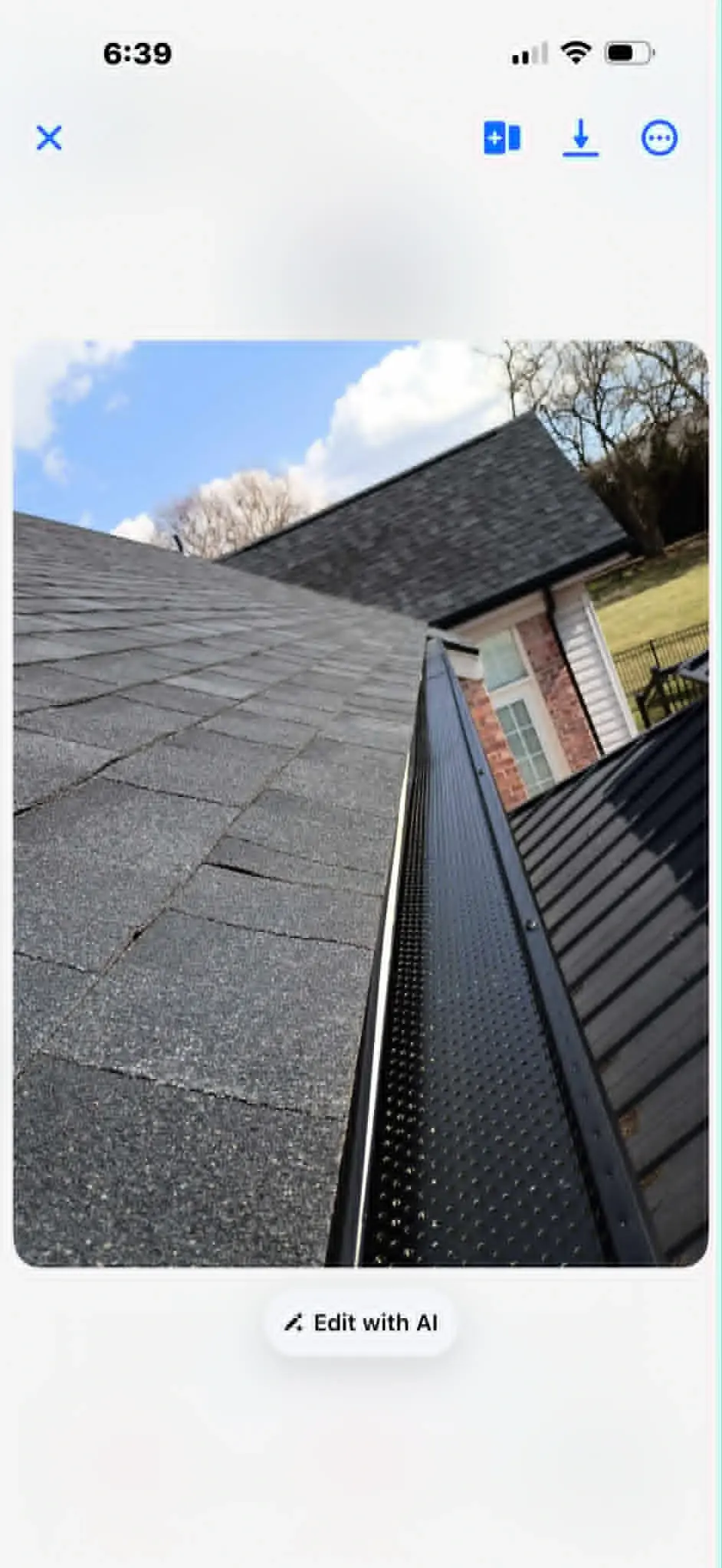 Gutter and flashing detail along a residential roof edge