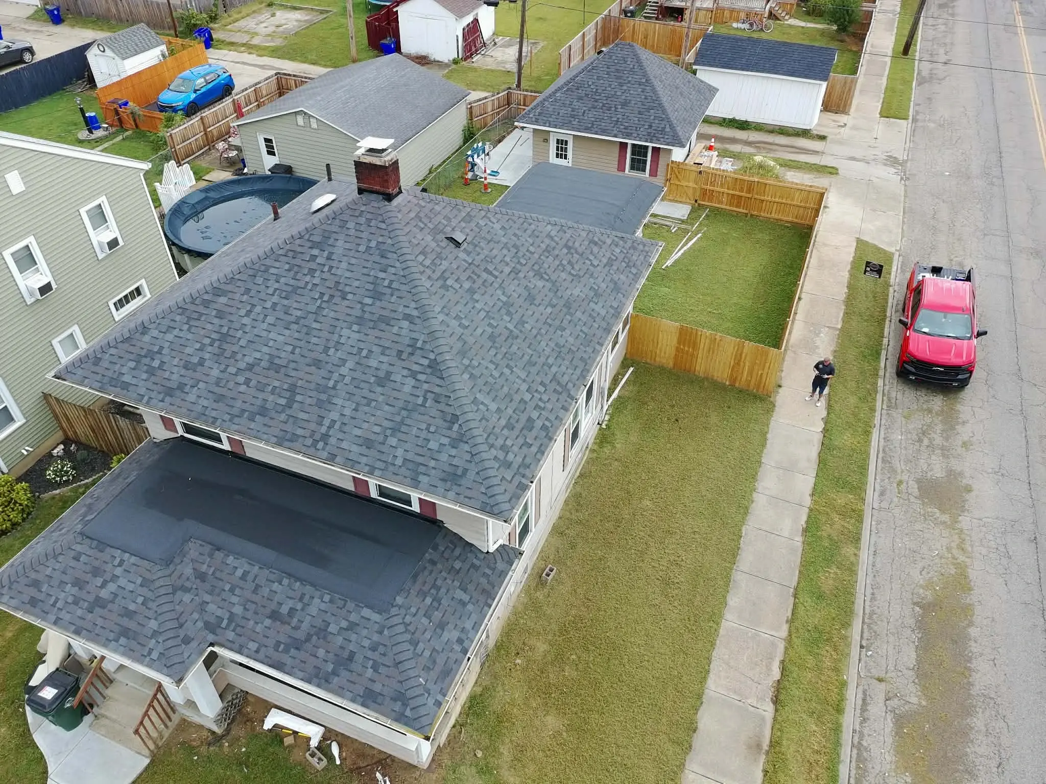 Completed home with coordinated roof and gutter installation