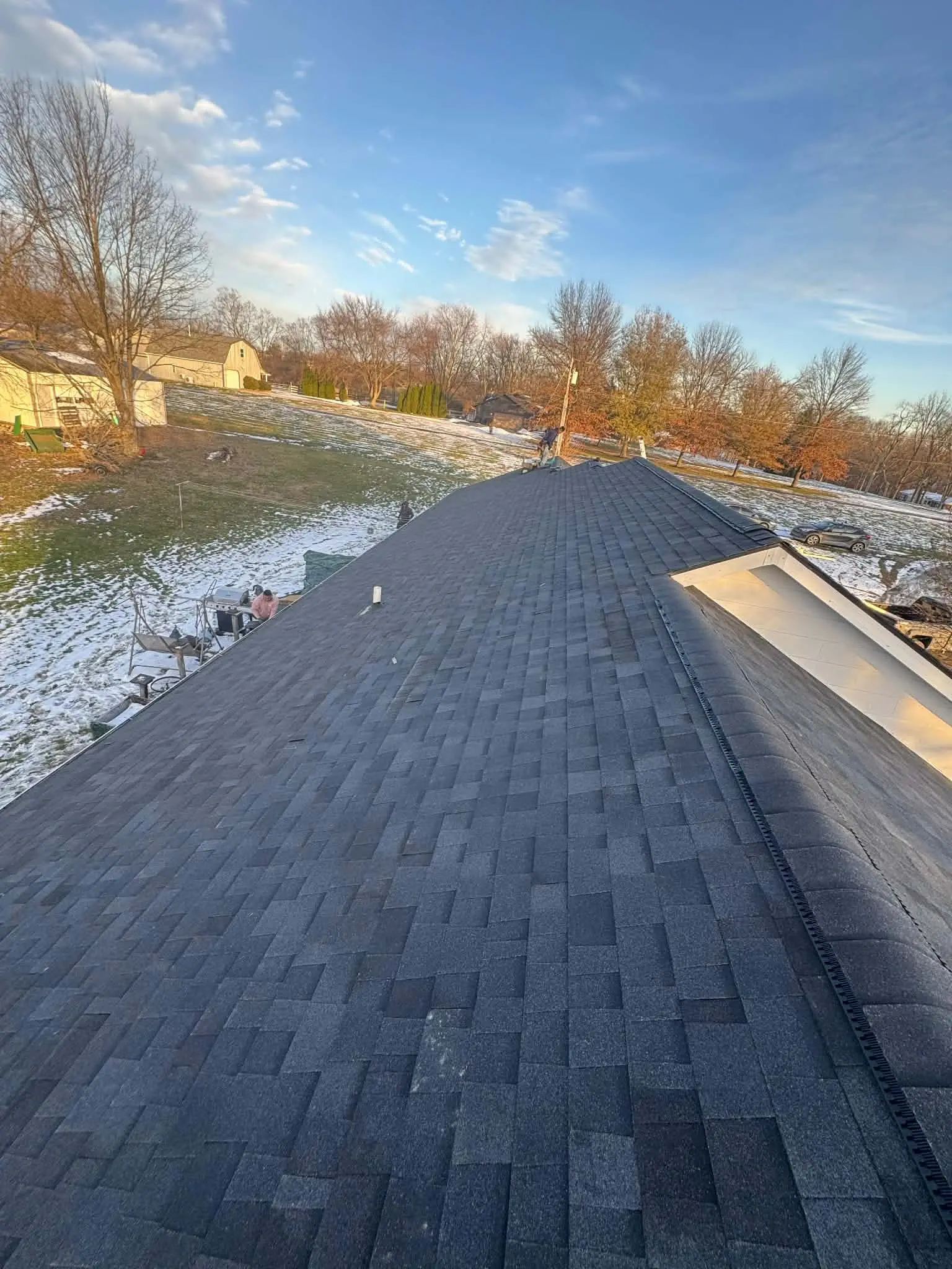 Completed shingle roof install finished during Ohio winter weather