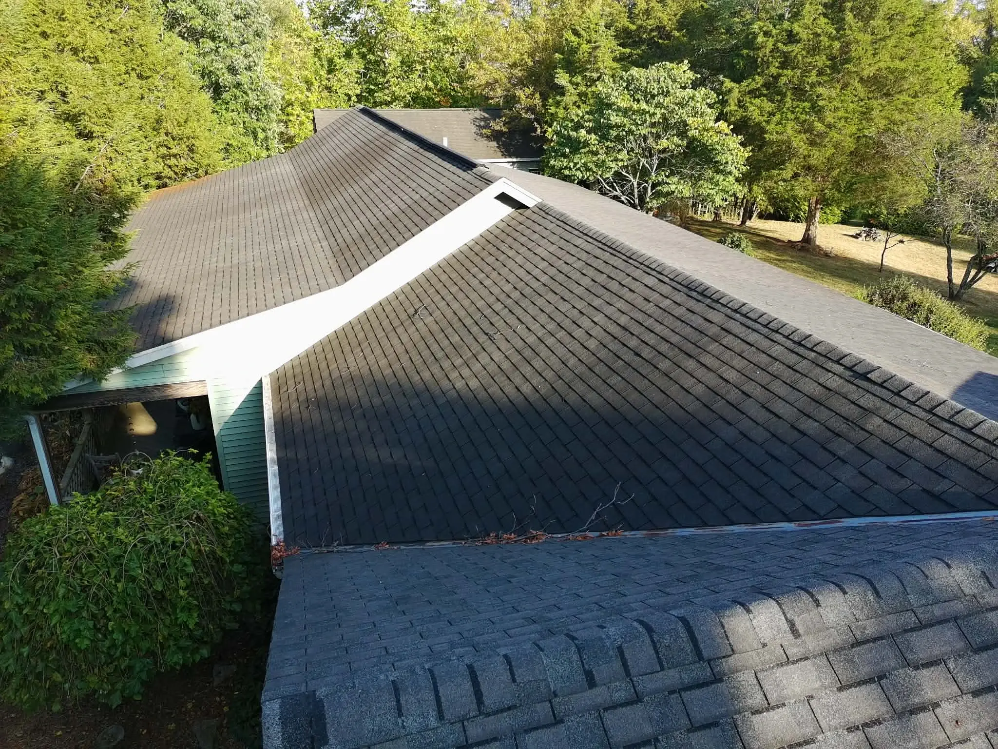 Close-up of newly installed shingle courses on a roof replacement