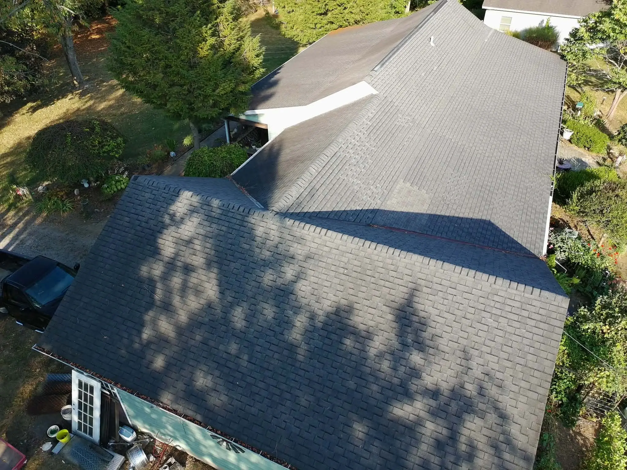 Drone view of a finished residential roof replacement project